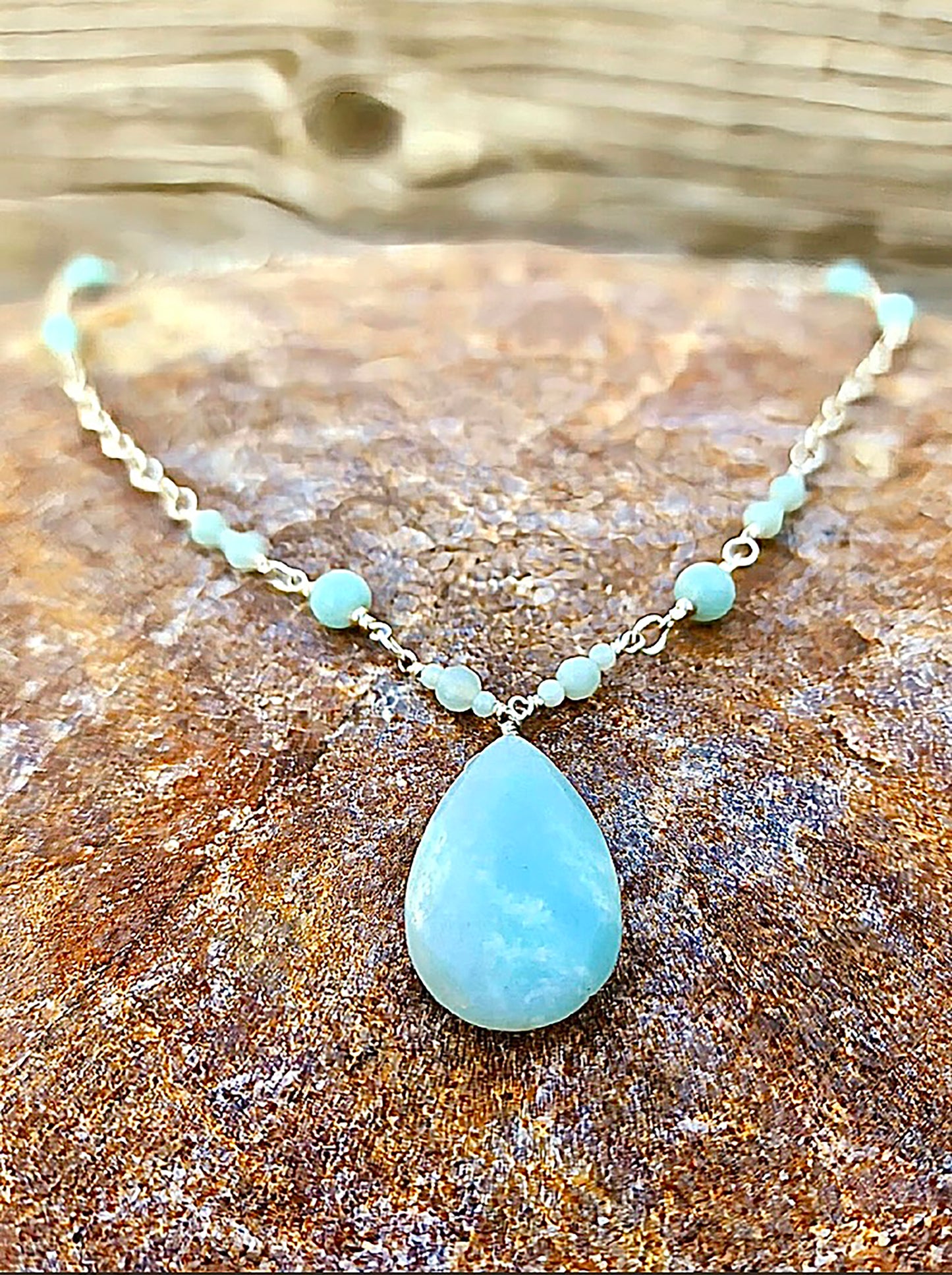 Treasured by the ancient Egyptians, Amazonite has always been prized for its beauty, healing power, and encouraging good luck and fortune. Wire wrapped chain with amazonite beads interspersed and 1.25" drop. Length: 20". Available in silver or gold filled.