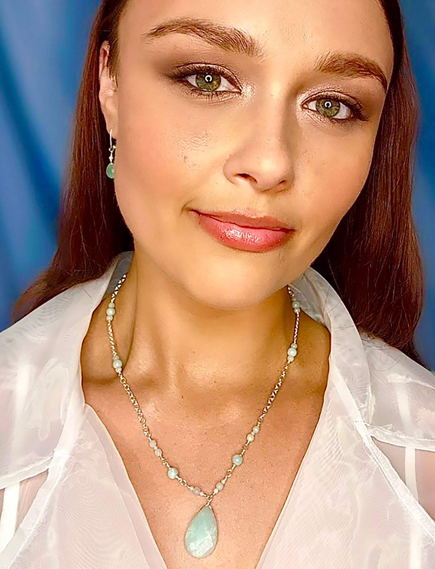 Treasured by the ancient Egyptians, Amazonite has always been prized for its beauty, healing power, and encouraging good luck and fortune. Wire wrapped chain with amazonite beads interspersed and 1.25" drop. Length: 20". Available in silver or gold filled.
