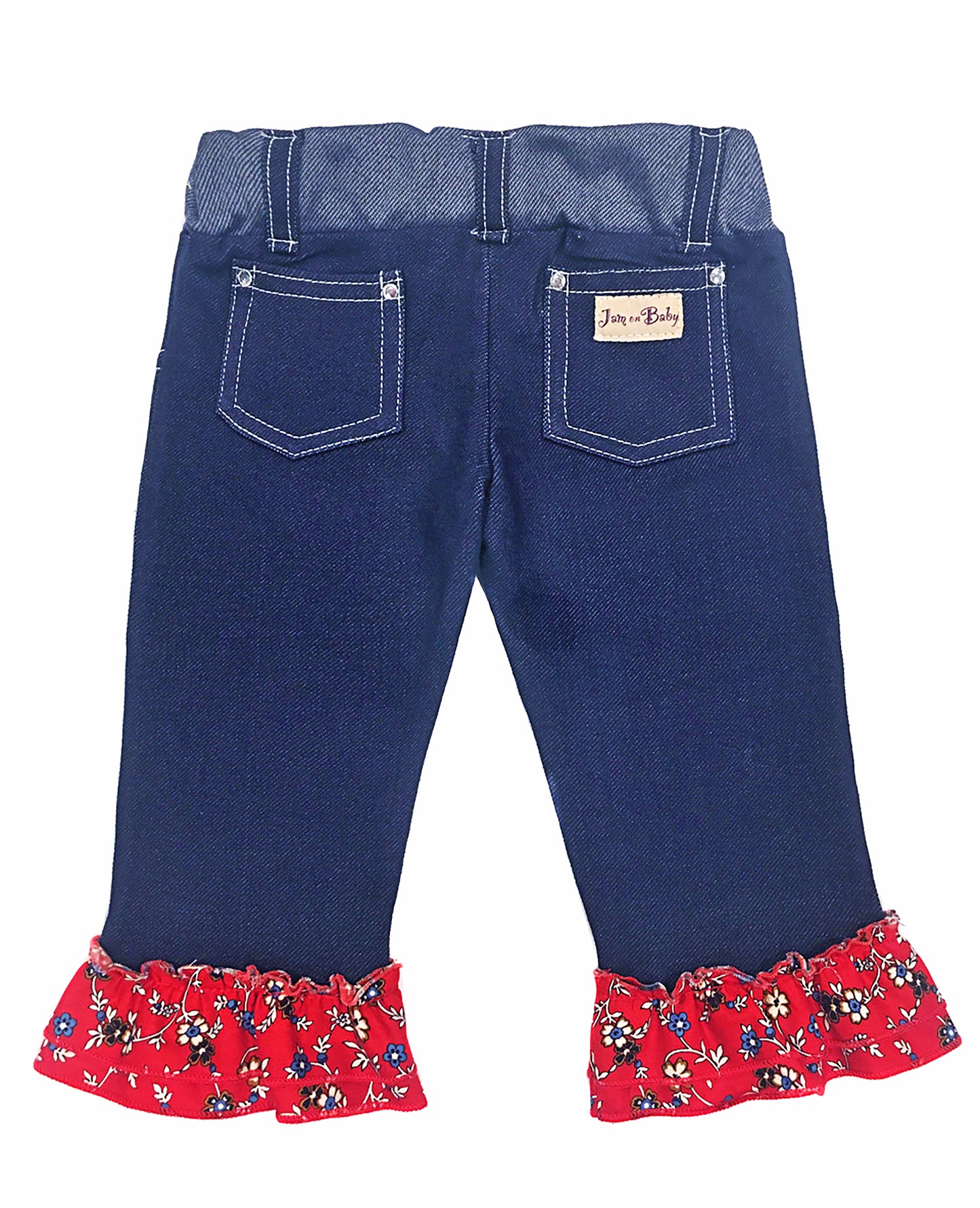 Our capri ruffle jean is a staple favorite. Lightweight denim knit with contrast top stitching, red floral, print ruffle trim, and rhinestone accents on the pockets. Elastic waist for easy on and off. Machine wash cold, low heat Made in the jammin' USA