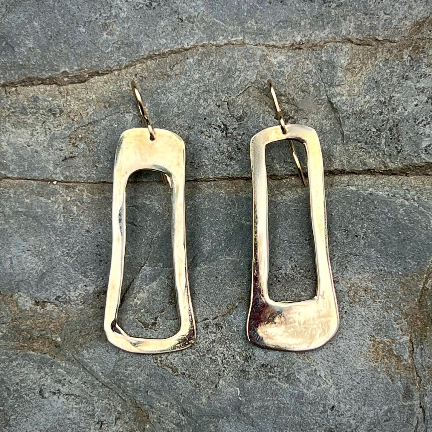 The Marlow Earrings are striking, delicate and light. Each pair is carefully cut, filed and smoothed to a mirror finish. Clean regularly with polishing pad or soft cloth and mild soap Consciously made in New York