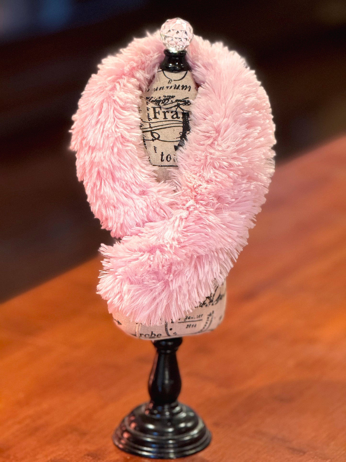 Wrap yourself with a cuddly soft, faux fur neck warmer. These luxurious accessories blend style and warmth seamlessly. Each Neck Cozee is hand crafted with premium faux fur and a crocheted pom pom closure. Say goodbye to scarves that slip and slide, Neck Cozees stay in place and add a touch of elegance to any look. Dimensions: 21 inches long, 3.75 inches wide Hand wash cold, line dry, or dry clean Consciously made in California