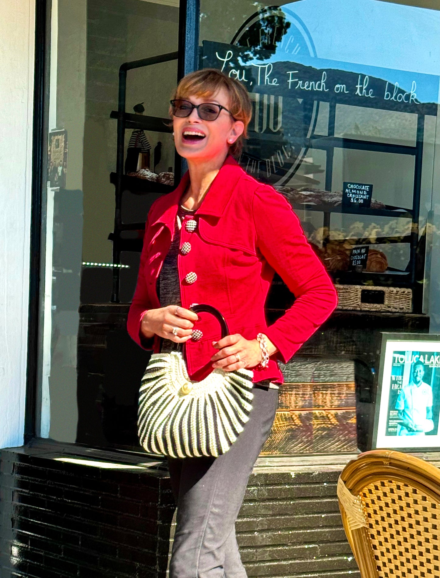 Black & white stripe, vintage crocheted bag is a homage to the 60's chic style of Brigette Bardot. 6" black Lucite twin handles and large pearl button closure on each side. Hand crocheted with upcycled acrylic yarn by Oda G. exclusively for MarVia Square. Dimensions: Height:15" Length:13" Width: 6" Hand wash cold Made in California