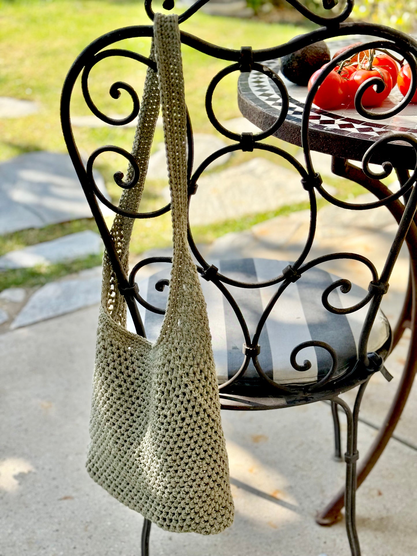 We love to support our local farmer's markets, which inspired us to create the Toulouse Market Bag. Hand crocheted with upcycled cotton blend yarn to ensure great strength and stretch, including inside pockets for your wallet and phone. Dimensions: 13" wide, 12" high, (26" high with shoulder strap) Hand wash with mild soap and cold water, or Dry Clean Consciously made in California