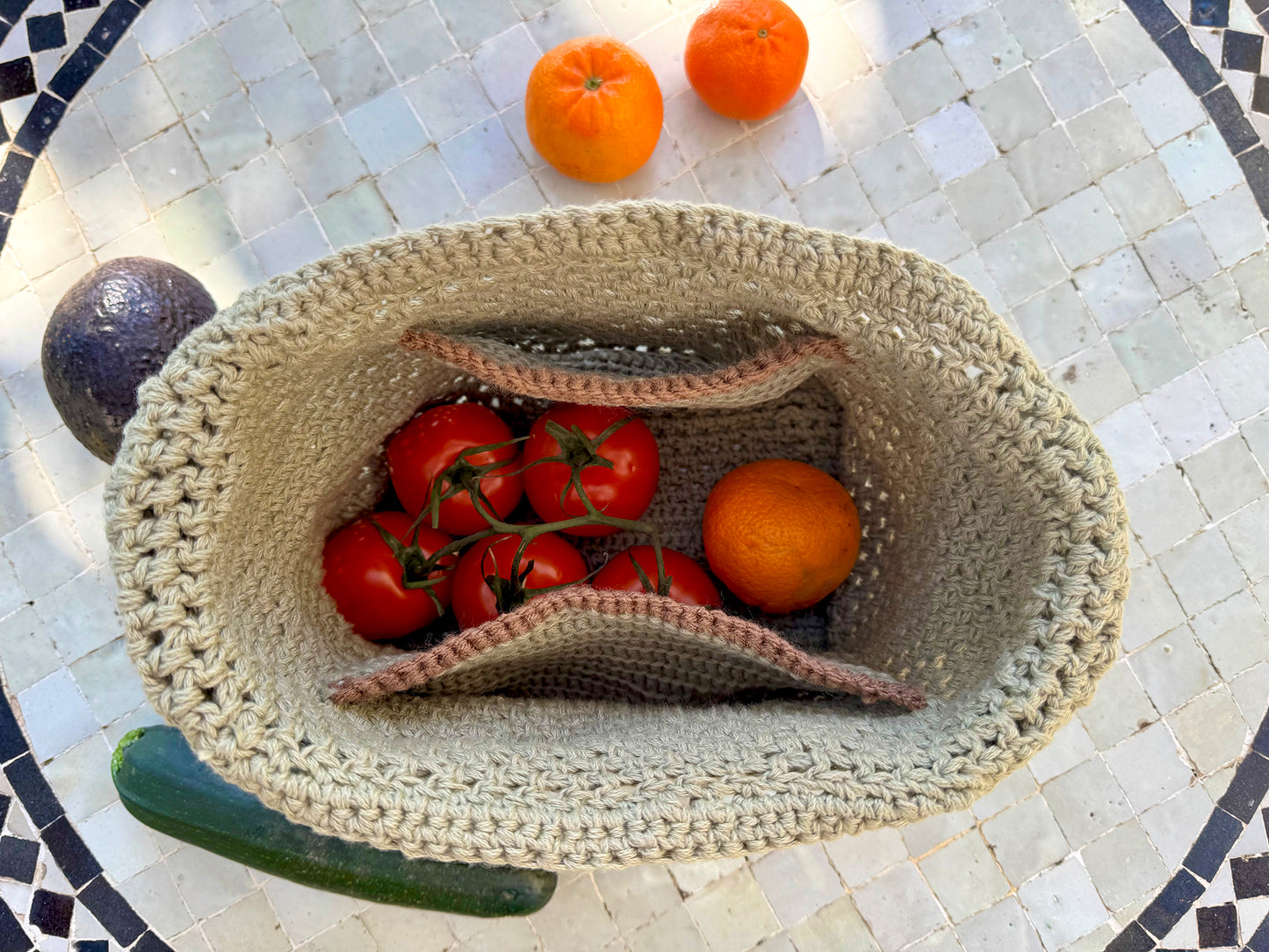 We love to support our local farmer's markets, which inspired us to create the Toulouse Market Bag. Hand crocheted with upcycled cotton blend yarn to ensure great strength and stretch, including inside pockets for your wallet and phone. Dimensions: 13" wide, 12" high, (26" high with shoulder strap) Hand wash with mild soap and cold water, or Dry Clean Consciously made in California