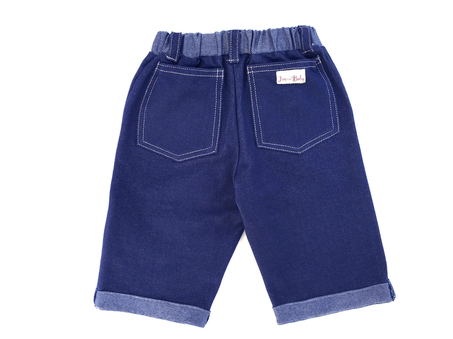This classic crop jean is made from the softest denim knit with knee protecting padding for active crawlers and reinforced knee for toddlers. Front button coin pocket and back pockets. Cuffed hem and elastic waist for easy on & off. Machine washable Made in the jammin' USA