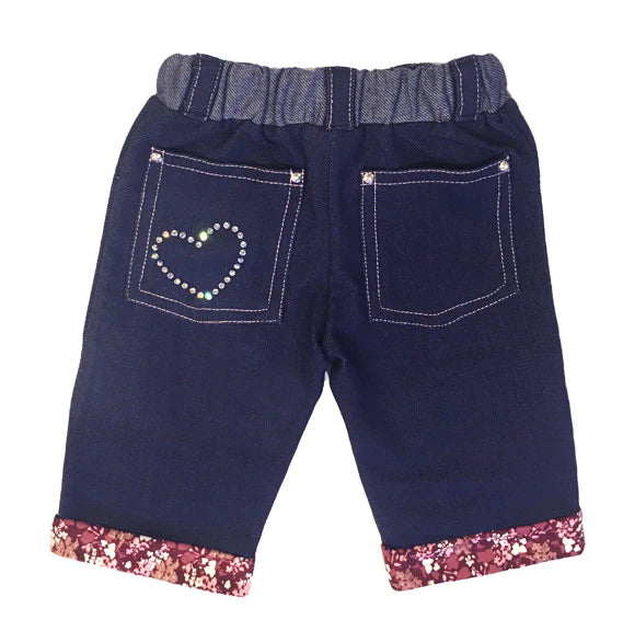 Soft denim knit with reinforced knee for toddlers. French floral print cuff with silver rivet detailing on pockets, rhinestone heart on back pocket, and elastic waist for easy on and off. Machine washable, cold (inside out to protect rhinestones), low heat Consciously made in California