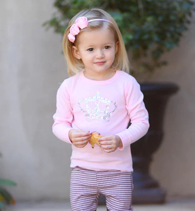 Every little princess needs a touch of sparkle. This soft, long sleeve cotton thermal tee is inspired from the royal 'West End' part of London. Rhinestone embellished crown on the front, and 'west end girl' on the back.