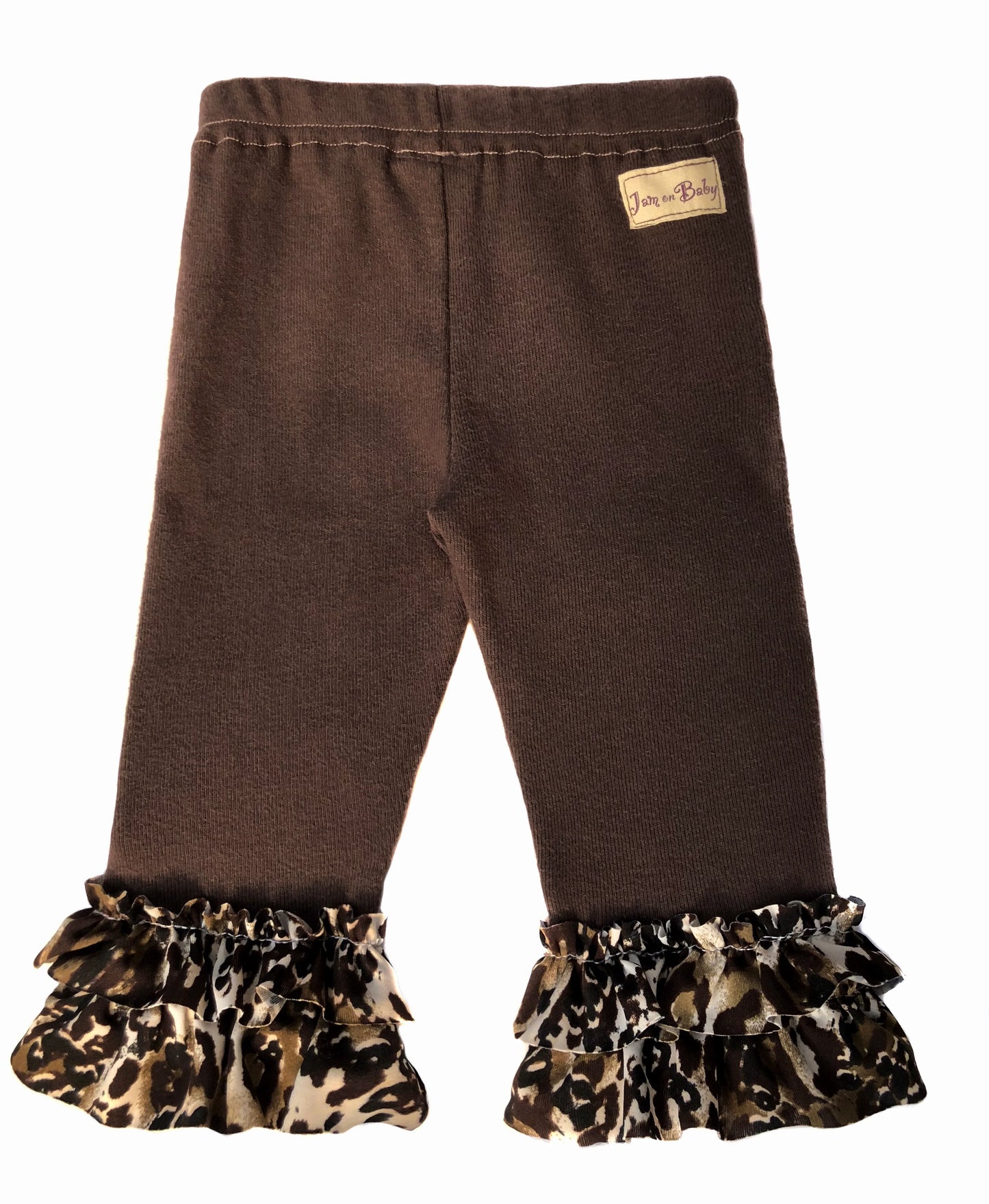 Most popular... our soft, sustainable combed cotton, rib knit legging with fully lined padded knee design. Leopard print ruffle trim in Lycra. Pair with reversible leopard cuddle vest to complete the look.