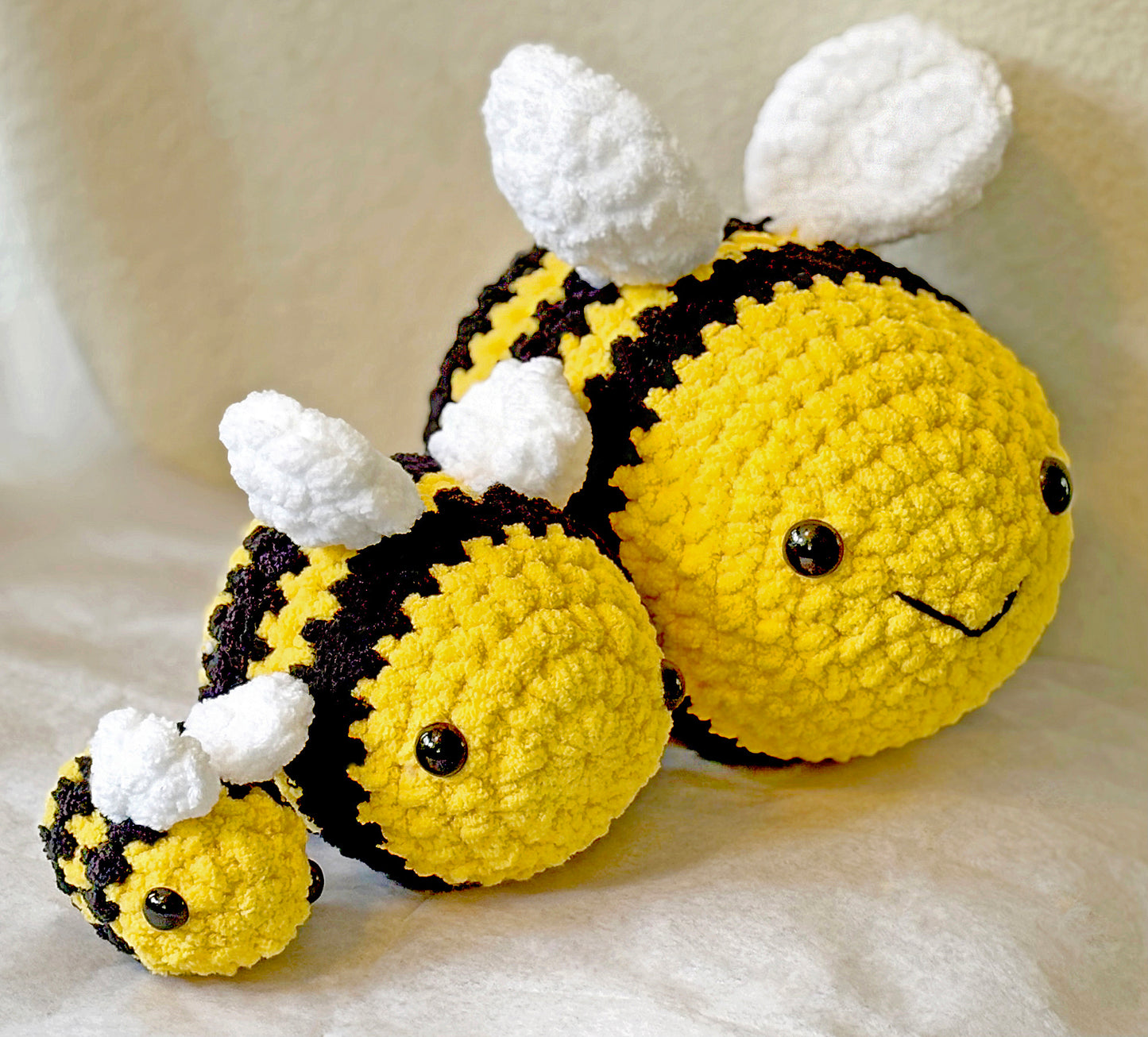 Busy Bumblebee crochet plushie collectibles are hand crocheted by Anya, MarVia Square's youngest artisan. Made with the softest, plush acrylic yarn, these adorable bumblebees have black stripes on a yellow body, with white wings, and mushroom bead (plastic) buttons for the eyes. Dimensions: Small: 3.5"long x 3"tall, Med.: 6"long x 4.5"tall, Large: 8.5"long x 6.5"tall Spot treat with mild soap Consciously made in California