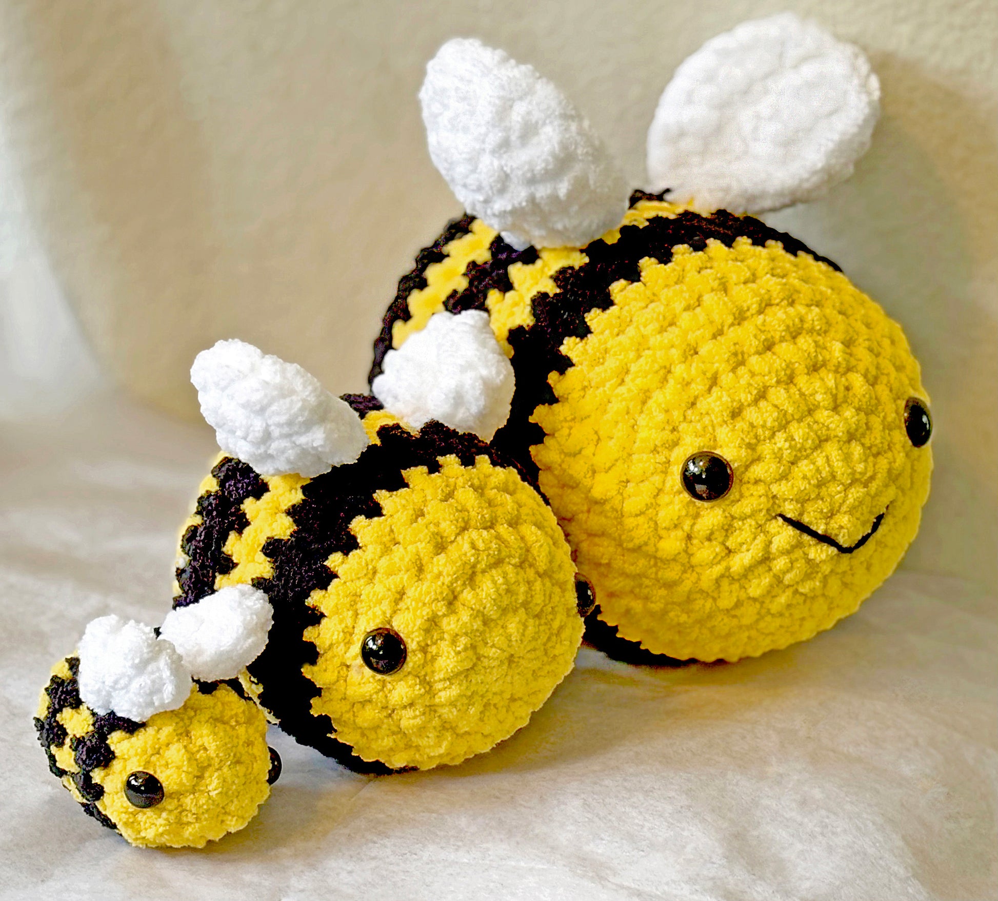 Busy Bumblebee crochet plushie collectibles are hand crocheted by Anya, MarVia Square's youngest artisan. Made with the softest, plush acrylic yarn, these adorable bumblebees have black stripes on a yellow body, with white wings, and mushroom bead (plastic) buttons for the eyes. Dimensions: Small: 3.5"long x 3"tall, Med.: 6"long x 4.5"tall, Large: 8.5"long x 6.5"tall Spot treat with mild soap Consciously made in California