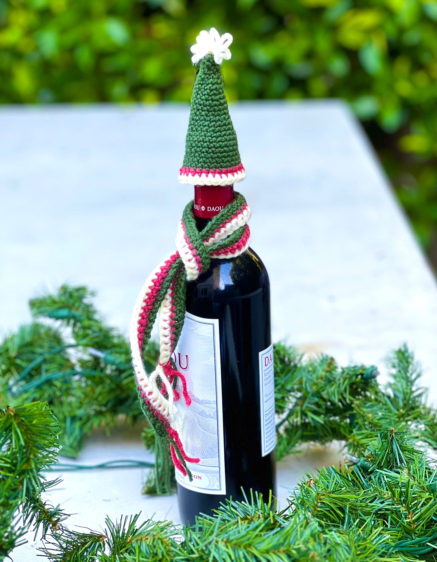 These knitted wine bottle topper hat & scarf sets make gift giving more fun. Made from upcycled acrylic yarn in three different festive styles. Made to order, please allow 3 to 7 days depending how many sets are ordered. Colors may also vary depending on availability. Acrylic yarn Hand wash cold, line dry Handmade in California