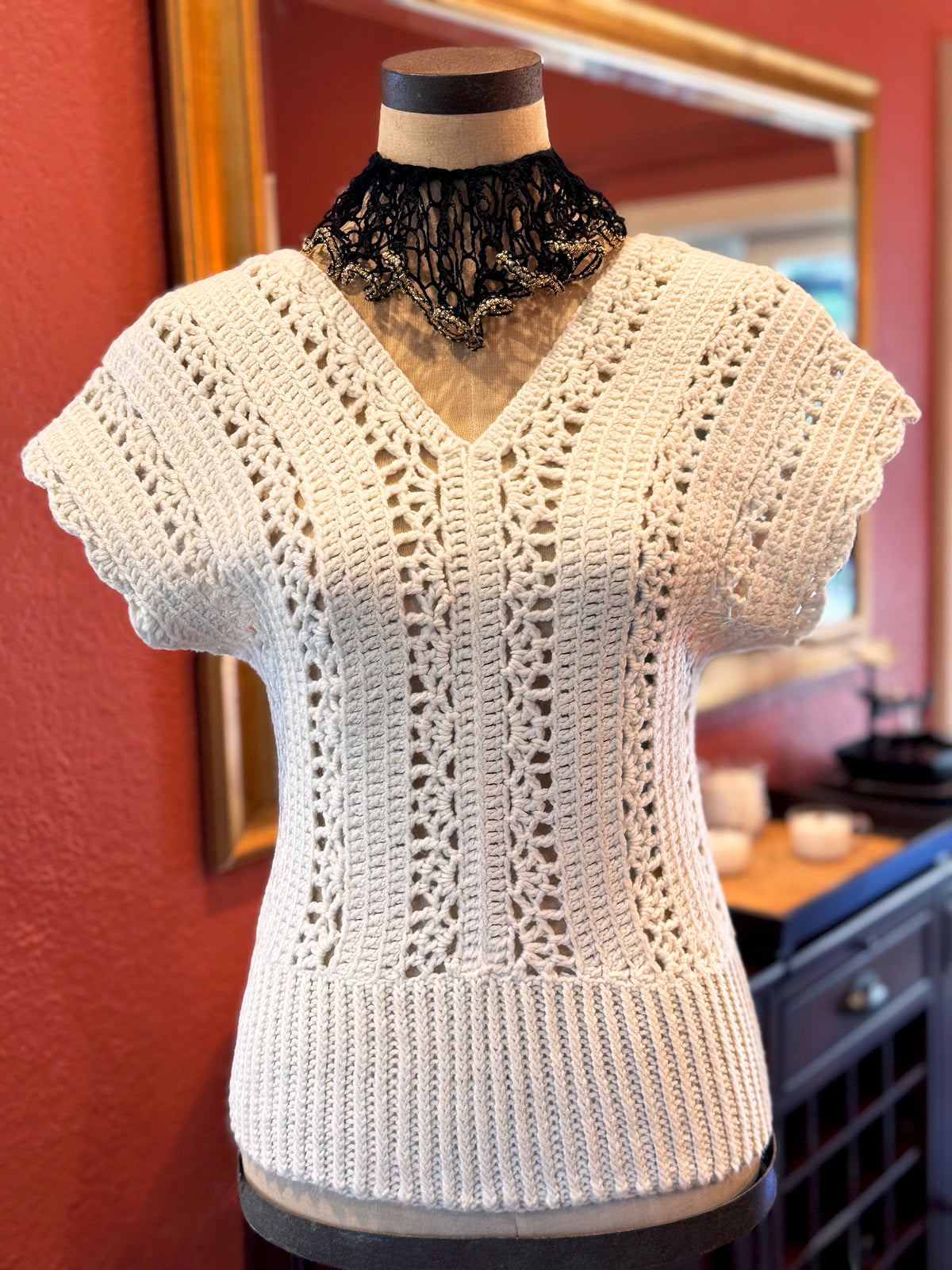 Italian inspired, the Murano crochet top is a timeless piece that can go from casual day to evening glam. Open stitch design with V neck (front & back) and scalloped edge short sleeves draping the shoulders. Made with upcycled cotton/acrylic blend yarn in ivory and impeccable craftsmanship by Oda G., this boho chic eye-catcher is a perfect addition to your wardrobe. Size: Small/Med., Length: 23" Hand Wash Cold or Dry Clean Consciously made in California