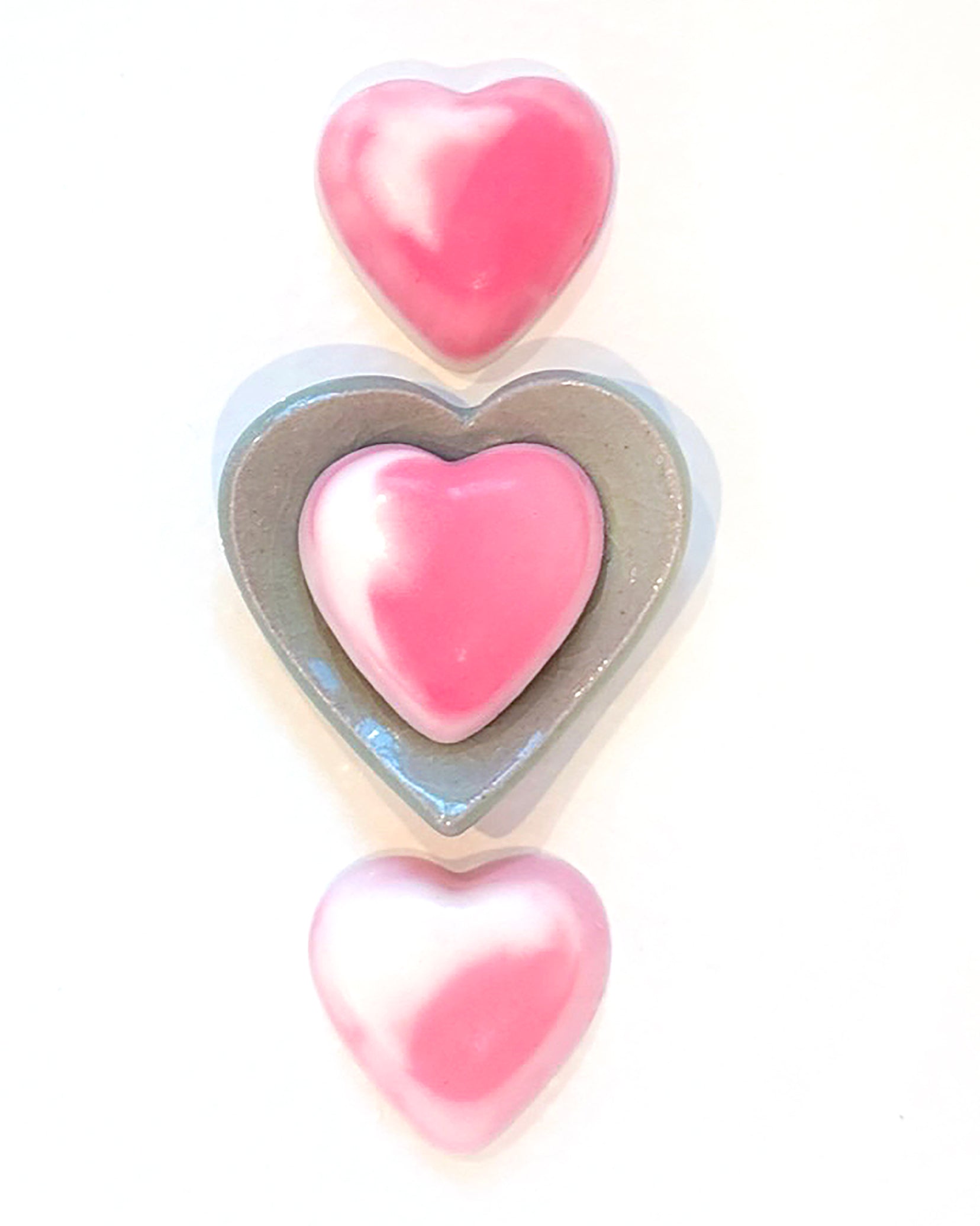 Hydrating Heart Soap  https://www.handmadeonmarviasquare.com/products/hydrating-heart-soap  Your skin will love the silky smooth feeling from these hydrating heart soaps by Patrice Angel Healing. Hand poured with Aloe vera and Mimosa scented shea butter. Each unique in design, so that no two soaps are alike. Dimensions: 3" x 3" Color: Rose & White Blend Handmade in California