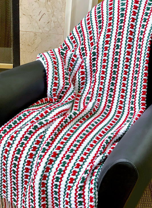 For the holidays or a special gift, create your own custom knit blanket throw with artisan extraordinaire, Oda G. and her magic hands. Made with high quality, soft acrylic yarn, and your choice of size and colors available. Simply email us with your design request and depending on size, allow 3 - 5 weeks to complete your custom design. Christmas Throw (med. size shown) is ready to ship in sizes small & medium Hanukkah Throw (med. size shown) is ready to ship Classic Throw (med. size shown) is ready to ship 