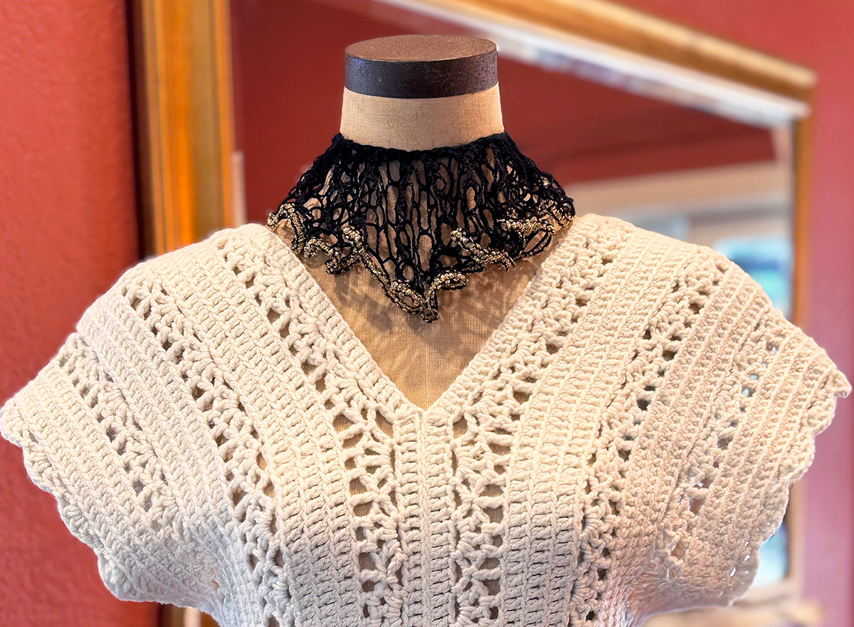 Luxurious scarves beautifully handcrafted by Oda G. to elevate your day or evening look. Each style is one of a kind and made with the highest quality yarns. *Can be custom ordered with colors of your choice if available. Allow 1 -2 weeks to complete. Please send us a message with your choice of colors and design. Description & Dimensions: Luxe Noir: Black & Gold cotton & metallic yarn - 40" length, 4" width (see all the variations on how to wear the Luxe Noir Scarf for any occasion) Luxe Domino: Black & Iv