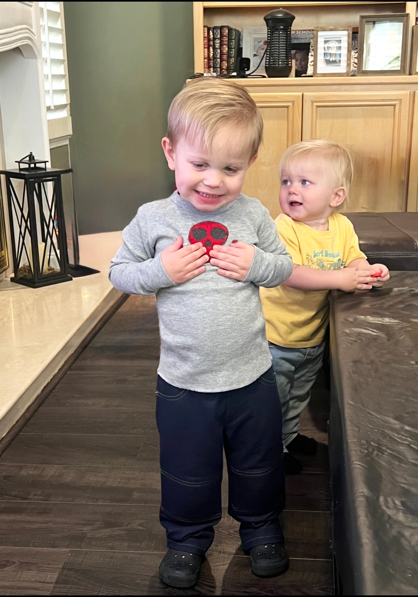 Arrr Matey! Your little pirate will love the red skull and crossbones applique in plush fleece on this soft, combed cotton, long-sleeve tee. Crew neck style for toddlers and lap shoulder design for infants. Infant sizes run slightly larger Machine wash cold (inside out), dry low heat Consciously made in the USA