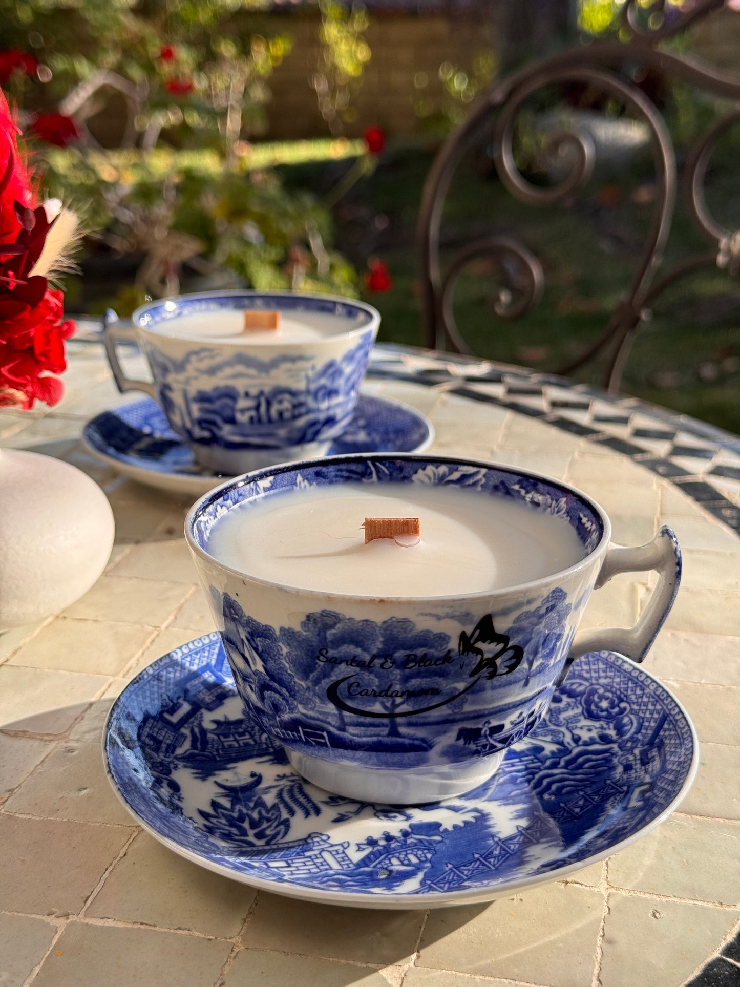 Memory Glow Candles have created a gorgeous vintage collection of hand painted porcelain tea cups for your home decor. Hand poured, 7 oz. with long lasting soy wax, natural wood wick, beautiful fragrance, and eco-conscious 'Made Better' certified. Dedicated to those touched by Alzheimer's, we honor our matriarch's enduring spirit, which continues to inspire and guide us. Fragrance: Santal & Black Cardamom - Musk, Vanilla, Amber, Water Lily, Sandalwood, Black Cardamom Dimensions: Cup - Diameter: 4.5", Hight: