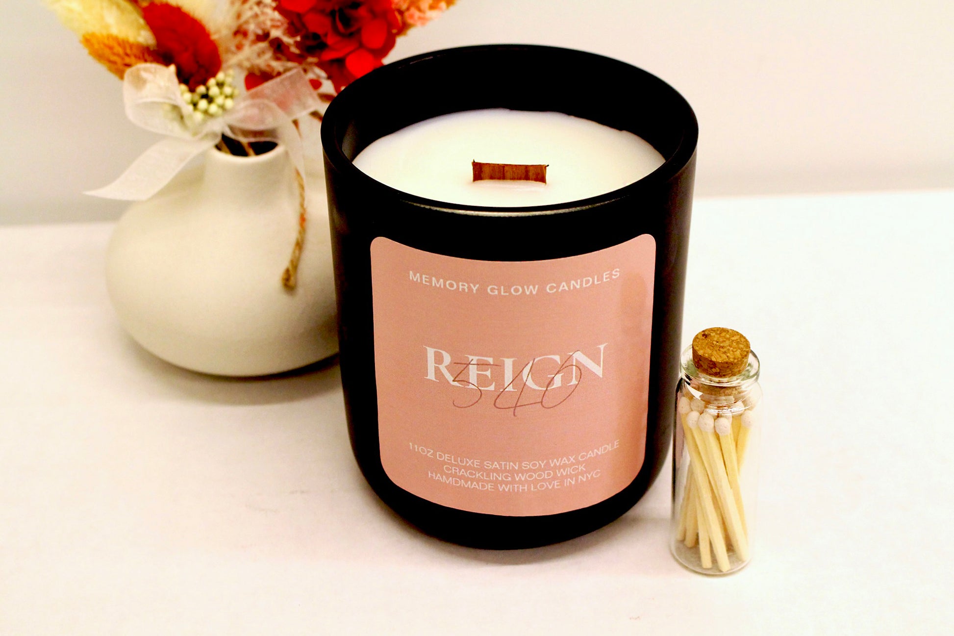 Indulge in a luxurious blend of Diva and Reign Memory Glow Candles. 11 oz. hand poured with long lasting soy wax, natural wood wick, and exquisite ingredients. Dedicated to those touched by Alzheimer's, we honor our matriarch's enduring spirit, which continues to inspire and guide us. Diva Amour: Clean, ozone, fruity green top notes with jasmine, lily of the valley, mid notes of lavender, bottom notes of wood, earth, and musk. Reign 540: Saffron, jasmine & crystal vanilla, balanced with rich suede, amber & 