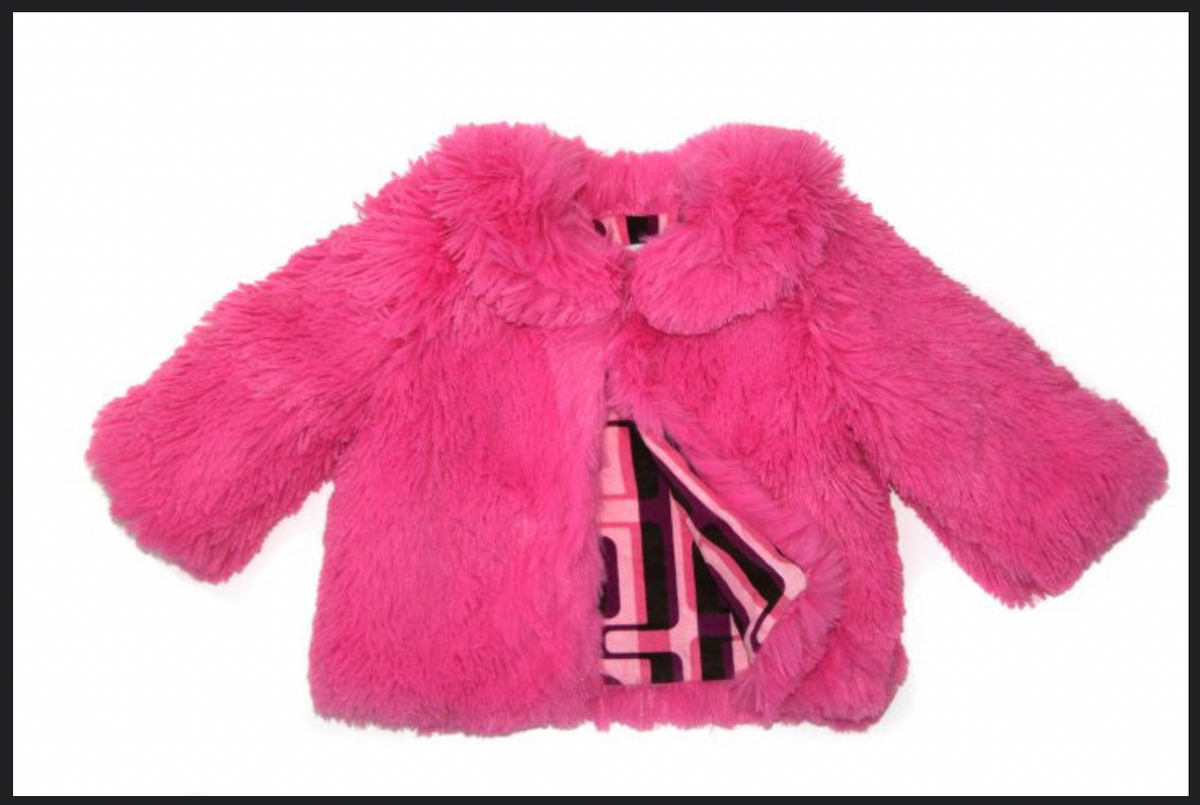 Coziest winter fashion coat that is also reversible. Inspired by the iconic 60's Mod style with fun print on cotton corduroy in pink & purple tones and plush faux fur your little princess will love. When reversed, the fun print, cotton corduroy has the faux fur trim on the collar, sleeves, and hem. Two fabulous couture coats in one! Dry Clean or Hand wash cold, Line dry. Made in California