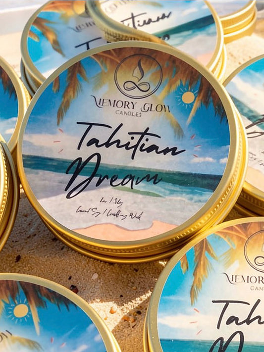Tahitian Dream candle is a luxurious, island escape blend of Lily, Jasmine, Sugar Amber, and Musk with Tahitian Vanilla. Hand poured with long lasting soy & coconut wax and natural wood wick in an 8 oz. amber jar or 2oz. travel size tin. As a set, plumes of bohemian pampas grass are combined with silk flowers in an ivory ceramic vase, along with a cork topped glass vile of wood matches.