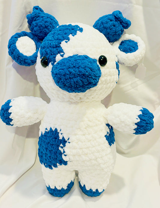 Adorable crochet plushie cow collectible is hand crafted by Anya, MarVia Square's youngest artisan. Made with the softest acrylic yarn, in blue & white. If there is a specific color combination you would like, they can be custom made upon request. Dimensions: 6" wide, 16" high Hand wash or dry clean only Consciously made in California