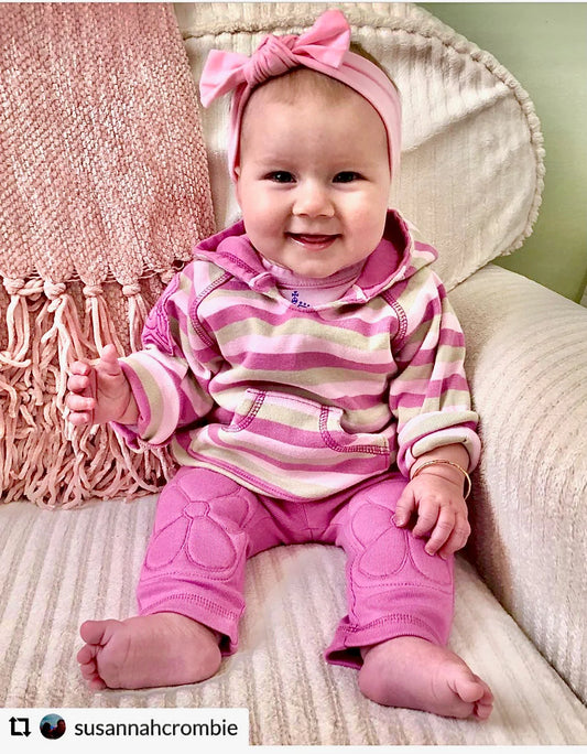 Pirate Princess, pink stripe hoodie is made with high quality, sustainable cotton, rib knit fabric. Easy on & off, with pink pirate patch on side of shoulder and kanga pocket for little treasures. Your pirate princess will be comfy-cozy while playing, and napping. 100% Cotton wash cold, line dry for longer wear made in the jammin' USA