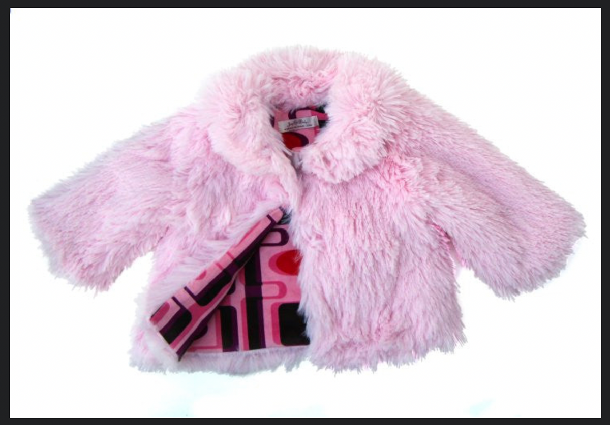 Coziest winter fashion coat that is also reversible. Inspired by the iconic 60's Mod style with fun print on cotton corduroy in pink & purple tones and plush faux fur your little princess will love. When reversed, the fun print, cotton corduroy has the faux fur trim on the collar, sleeves, and hem. Two fabulous couture coats in one! Dry Clean or Hand wash cold, Line dry. Made in California