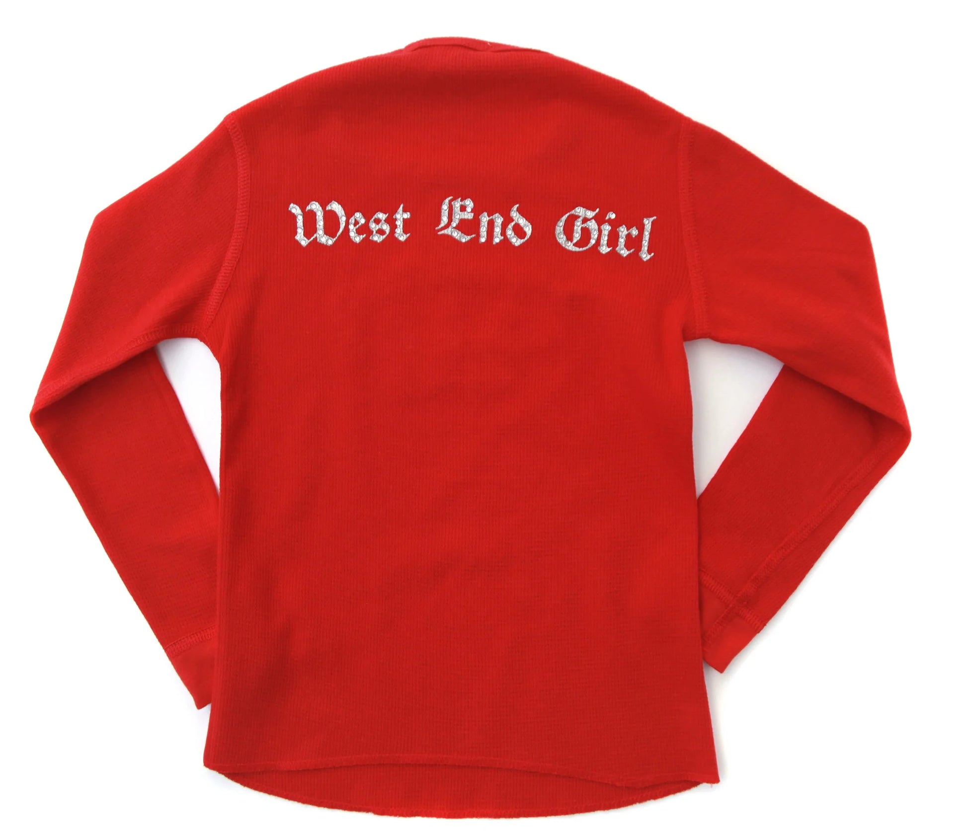 Every little princess needs a touch of sparkle. This soft, long sleeve cotton thermal tee is inspired from the royal 'West End' part of London. Rhinestone embellished crown on the front, and 'west end girl' on the back.