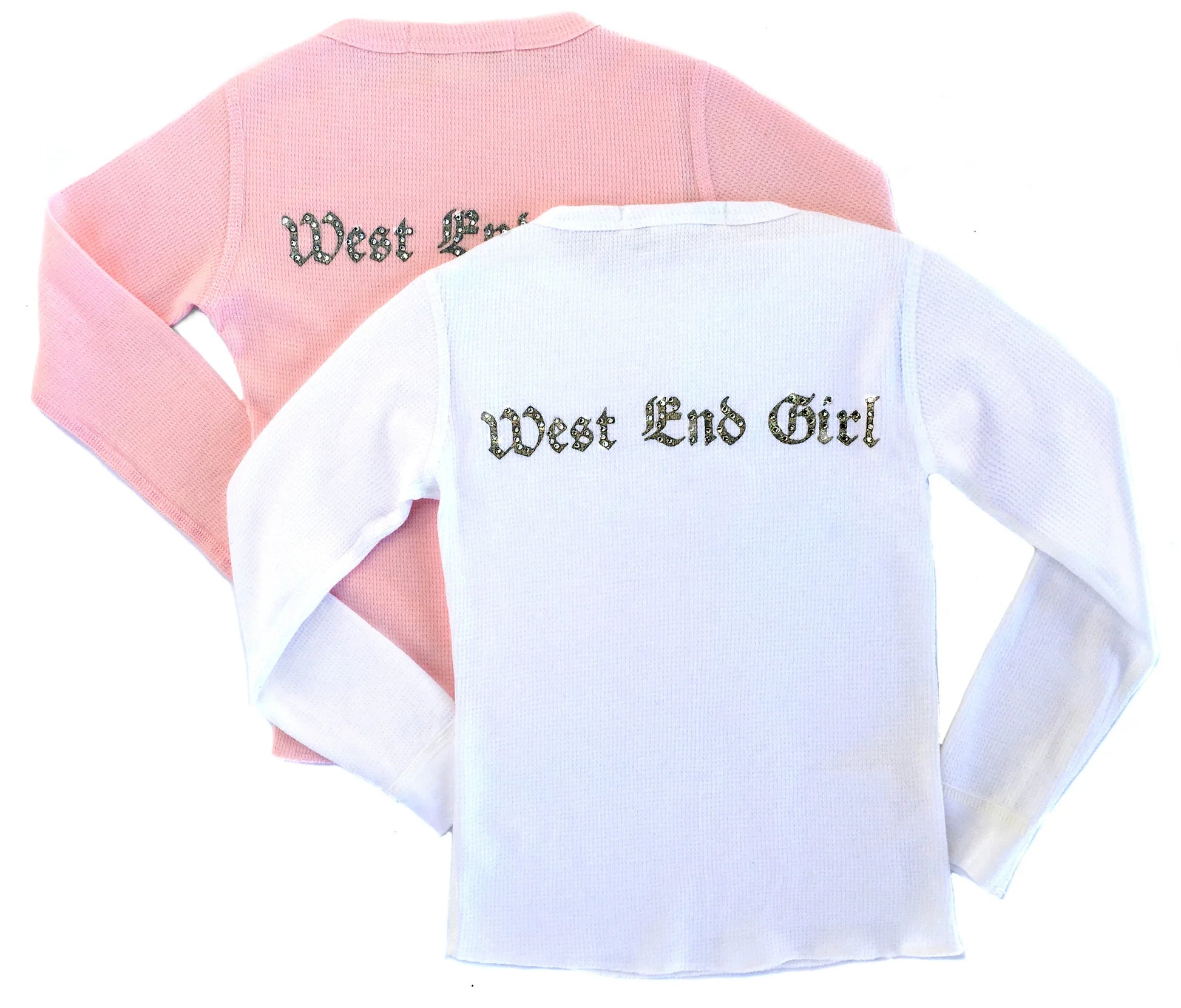 Every little princess needs a touch of sparkle. This soft, long sleeve cotton thermal tee is inspired from the royal 'West End' part of London. Rhinestone embellished crown on the front, and 'west end girl' on the back.